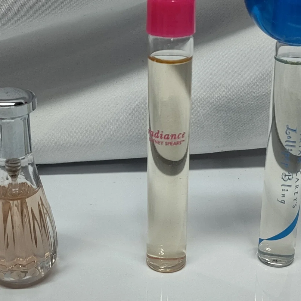 Mariah Carey's Lollipop Bling Britney Spears Radiance Truth travel scents light